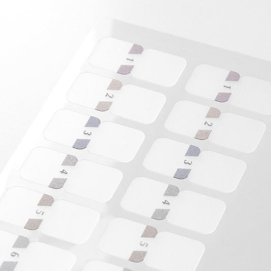Close-up of Midori Chiratto grey number index tabs