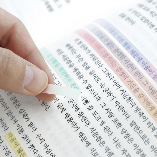 Translucent Iconic Long strips highlighting text in a book