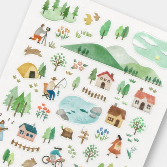 Mind Wave View 7am matte PET sticker sheet with morning landscapes, hills, lakes, trees, cottages, tents, cyclists, and outdoor scenes in soft colours