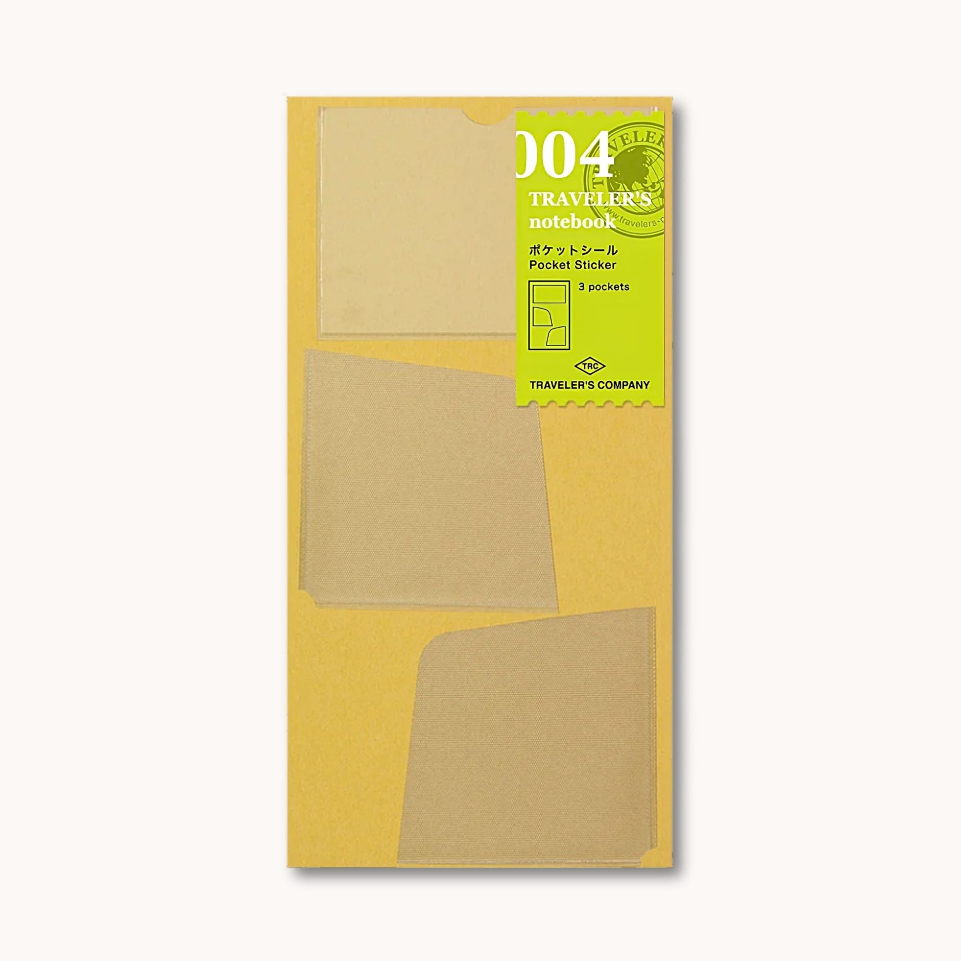 TRAVELER’S notebook self-adhesive pocket stickers with three clear PVC storage pockets for Regular Size notebooks.