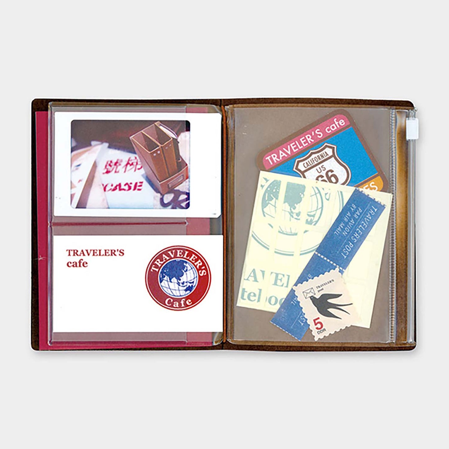 TRAVELER’S notebook Passport Size Refill 004 – Zipper Pocket insert with 1 zippered and 2 open pockets. Made of PVC.