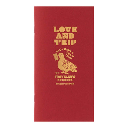 TRAVELER’S notebook Love & Trip refill with red cover and gold foil dove design. Includes MD Cream Paper and perforated message cards.