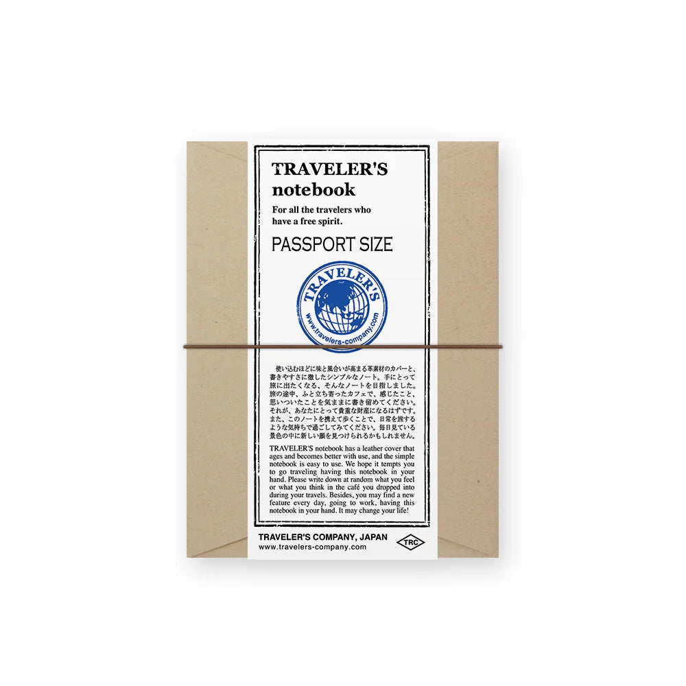 TRAVELER’S notebook Passport Size in Brown – leather cover with elastic closure, shown with accessories including cotton bag, refill, and spare band.