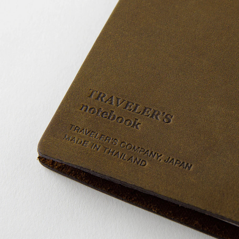 TRAVELER’S notebook Starter Kit in Olive – Regular Size leather cover with blank refill, cotton bag, and spare band