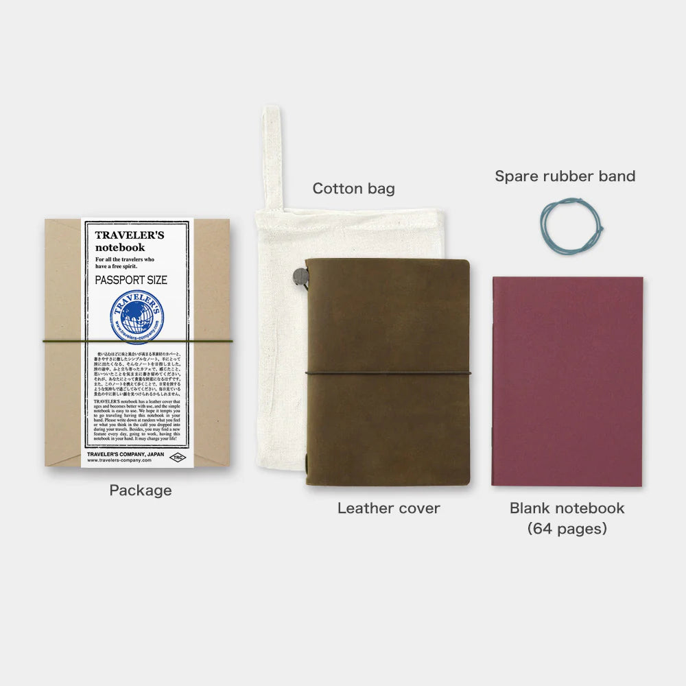 TRAVELER’S notebook in Olive – a dark brownish-green leather cover with earthy, rugged tones that deepen and develop a rich patina over time. Includes cotton bag, blank refill, and spare band.