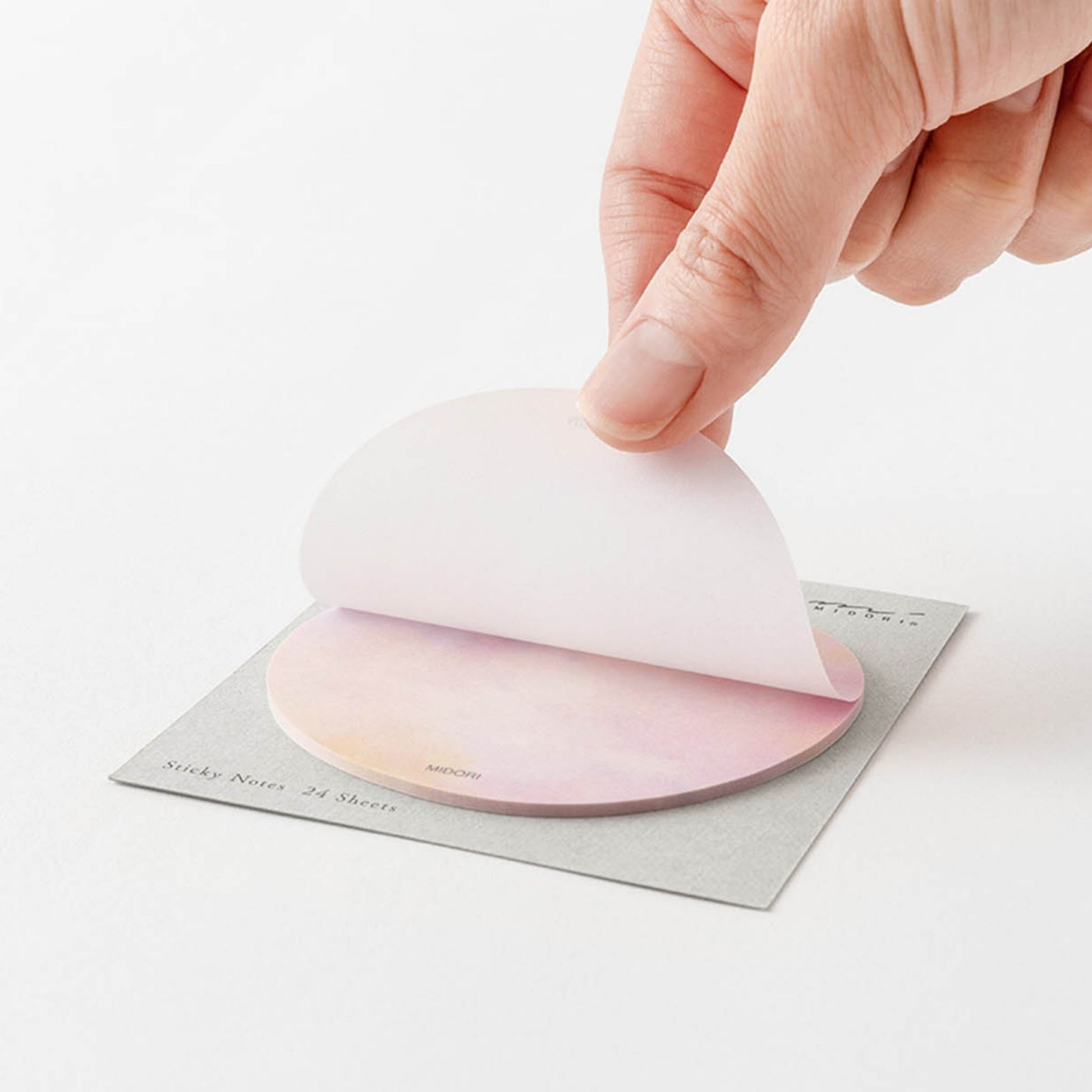 Midori Translucent Sticky Notes Sunset featuring a soft pink and peach sky design