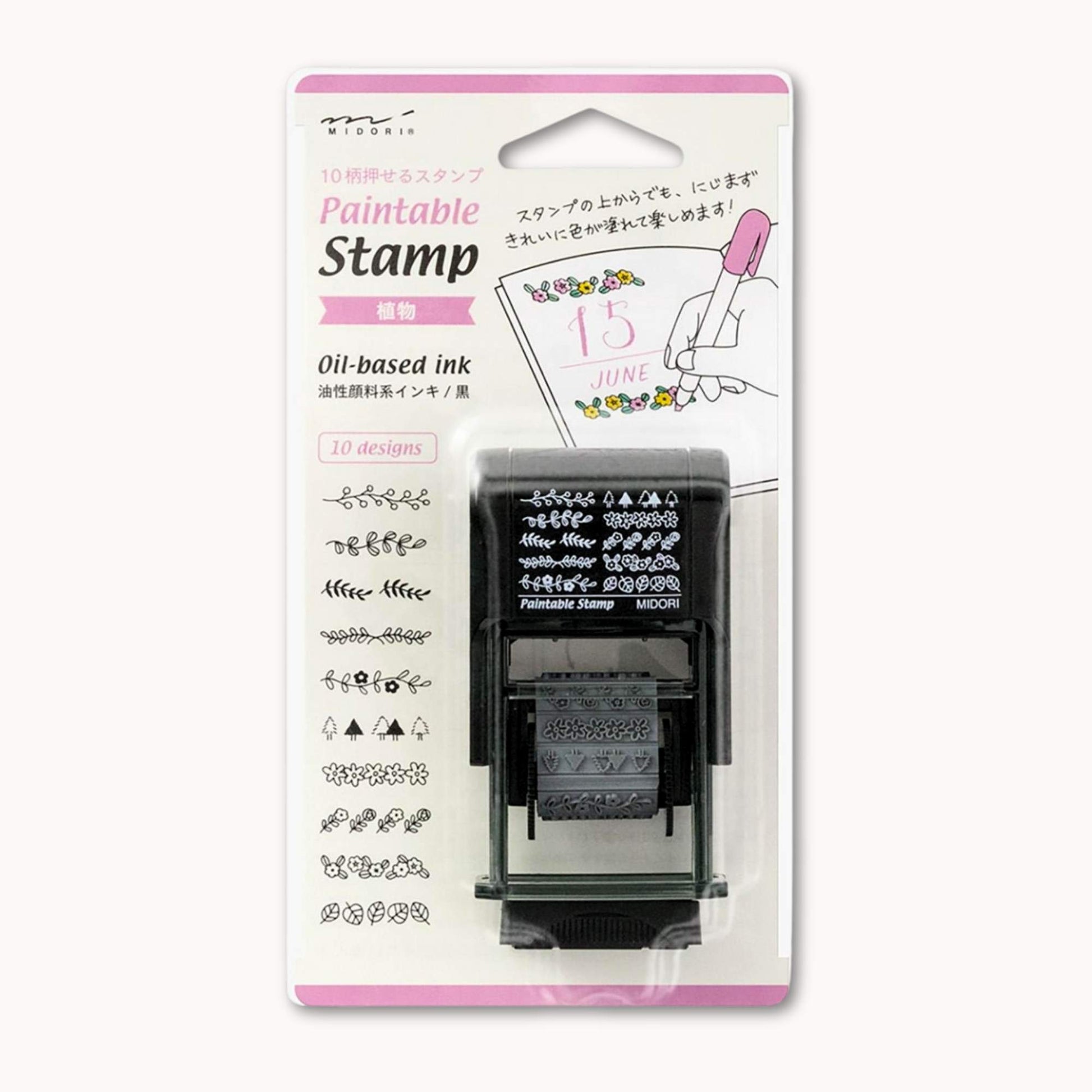 Midori rotating botanical stamp with multiple leaf and floral designs, pre-inked paintable Japanese stationery stamp