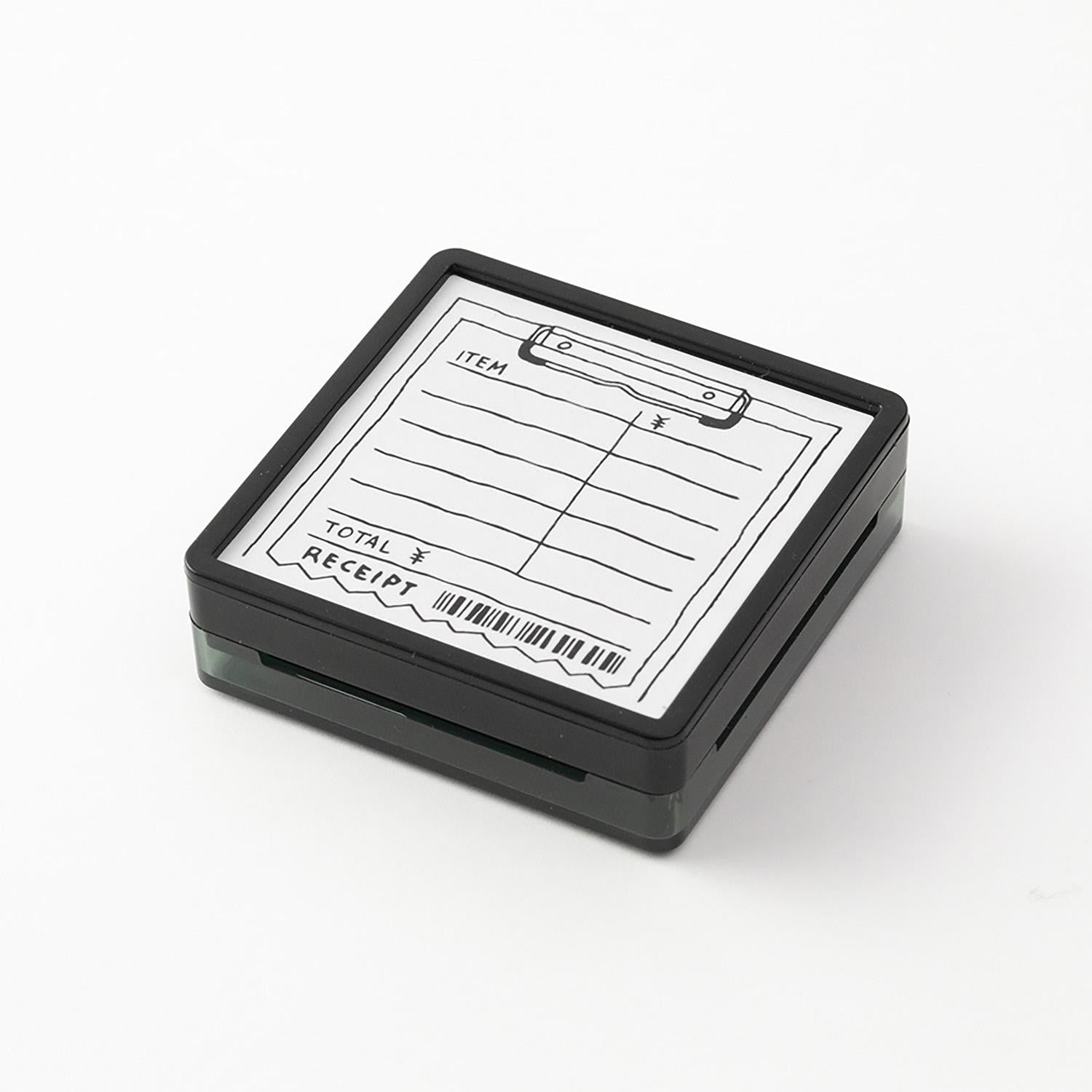 Midori pre-inked expense tracker stamp with receipt-style layout for tracking spending, black ink design, paintable journal stamp