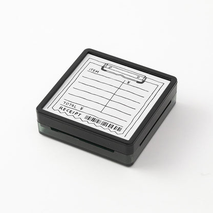 Midori pre-inked expense tracker stamp with receipt-style layout for tracking spending, black ink design, paintable journal stamp