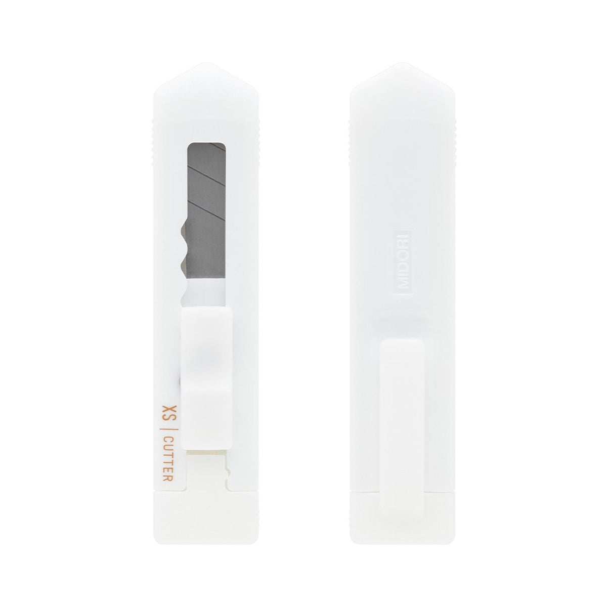 Midori XS white cutter beside its cap