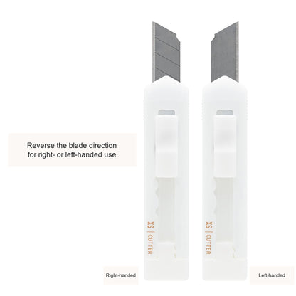 Midori XS white cutter showing the blade from both sides, with English feature captions