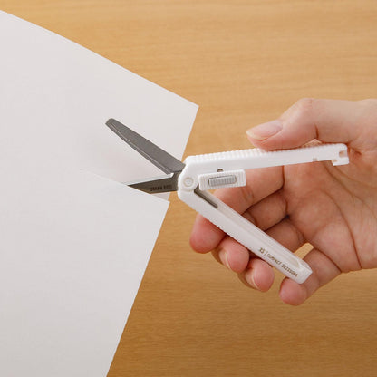 Midori XS white scissors cutting paper