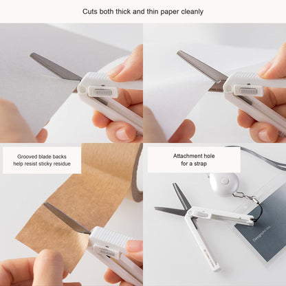 Midori XS scissors showing the sliding mechanism and grip, with English feature captions