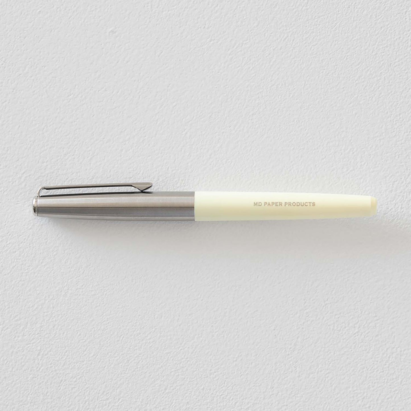 MD Product fountain pen with cream body, medium steel nib and black ink cartridge in presentation box