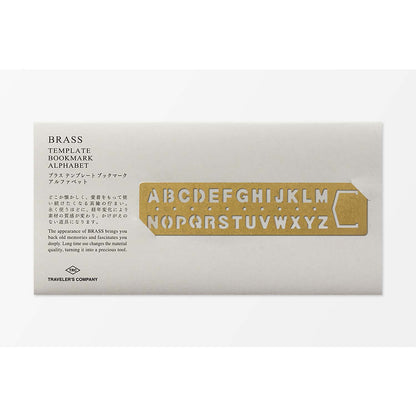 Brass stencil bookmark with uppercase A–Z letters by TRAVELER'S Company