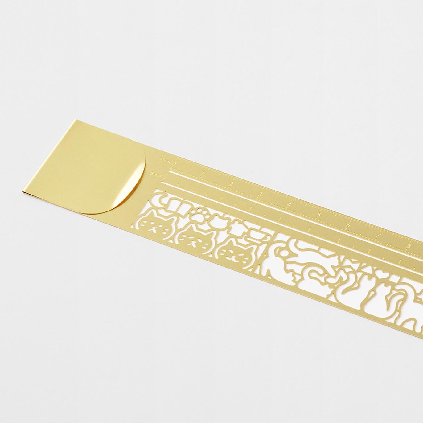 Midori Clip Ruler Cat featuring cat-themed stencil cut-outs in brass