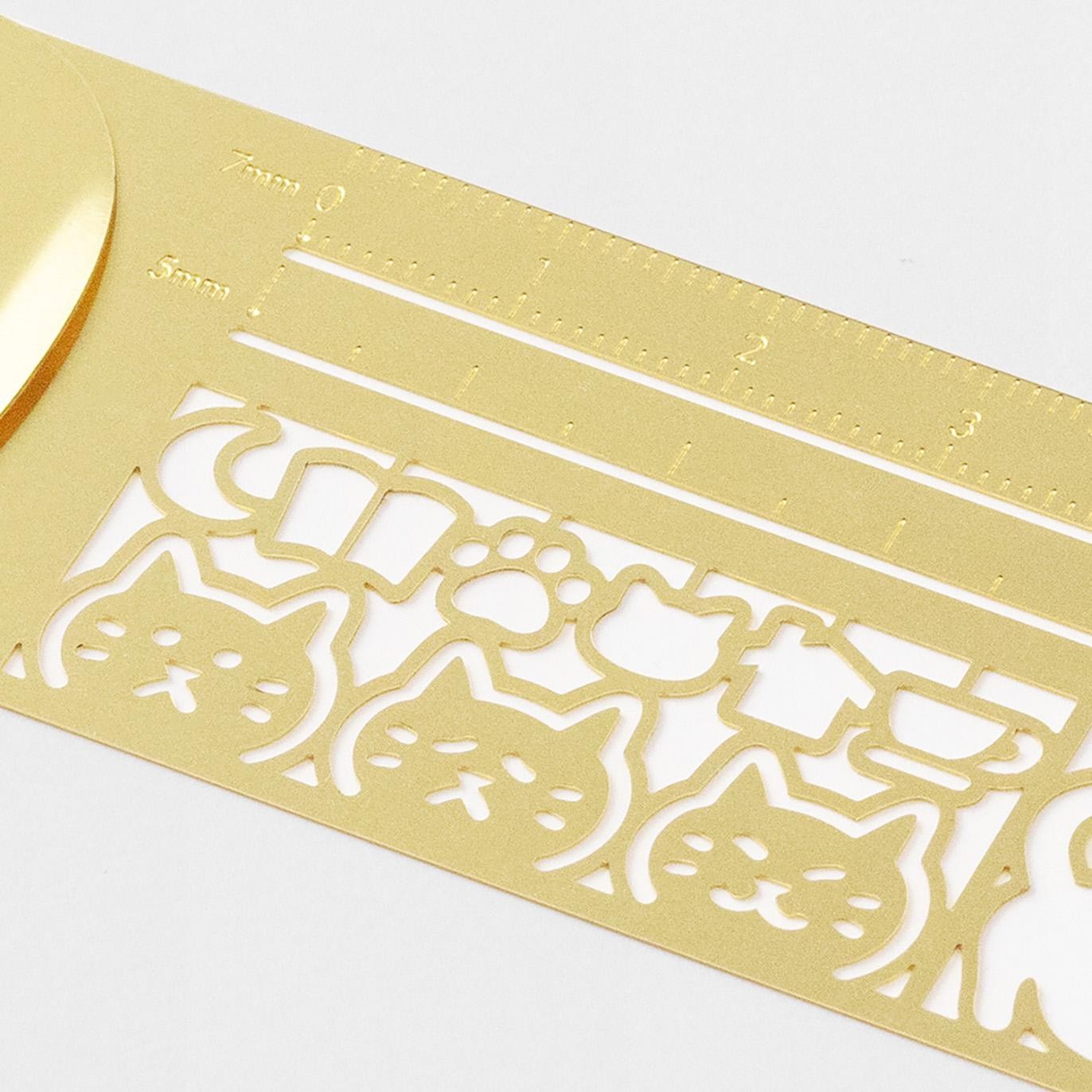 Midori Clip Ruler Cat featuring cat-themed stencil cut-outs in brass