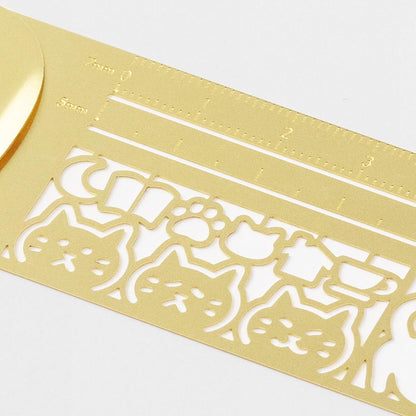 Midori Clip Ruler Cat featuring cat-themed stencil cut-outs in brass