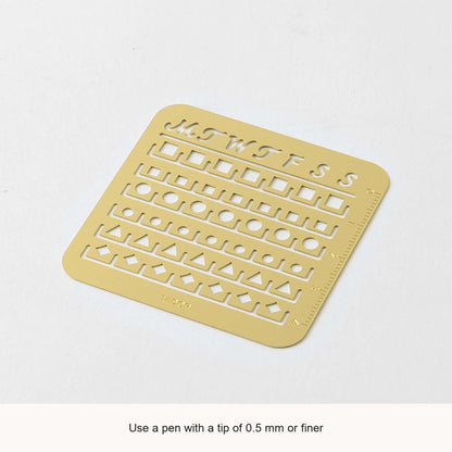 Midori Small brass calendar stencil with English guidance to use a pen tip of 0.5 mm or finer