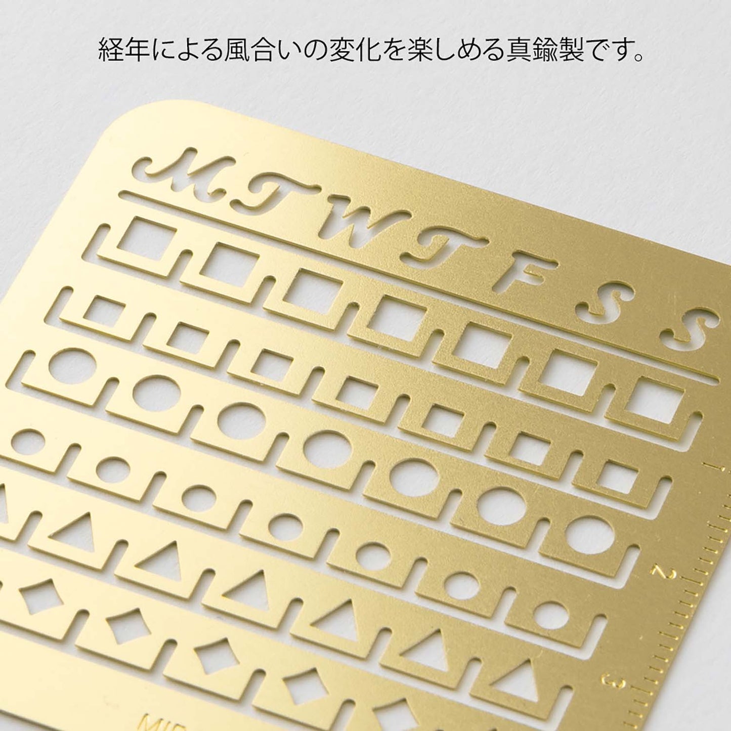 Midori brass monthly block calendar template with days of the week cut-outs, compact size for journaling and planners