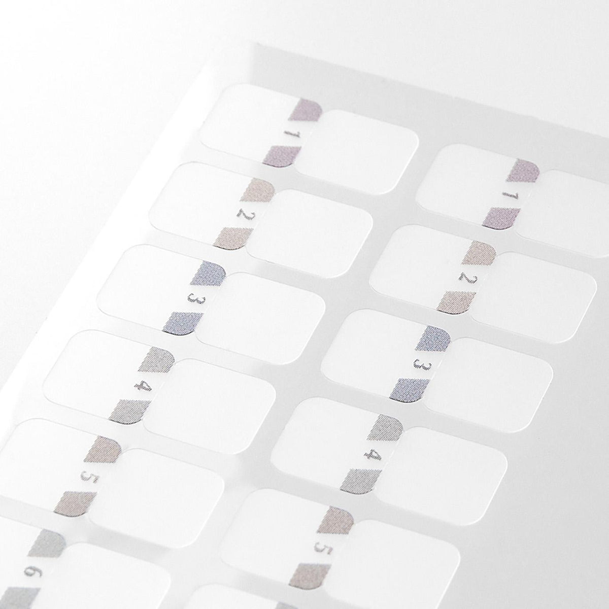 Close-up of Midori Chiratto grey number index tabs
