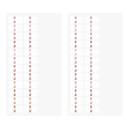 Two sheets of Midori Chiratto pink numbered index tabs
