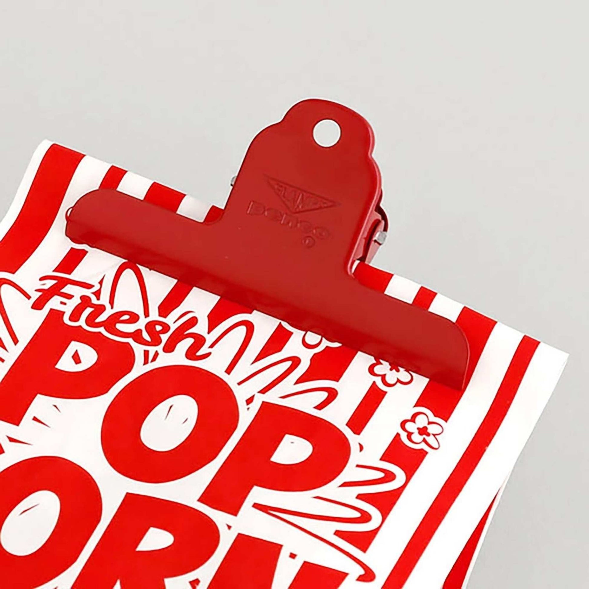 Penco red steel clip for papers and books