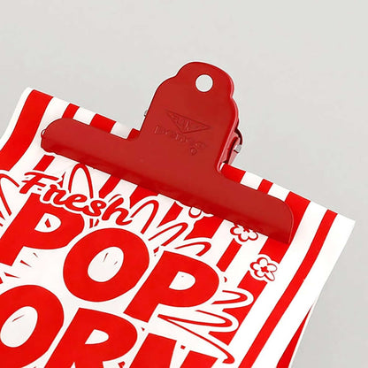 Penco red steel clip for papers and books