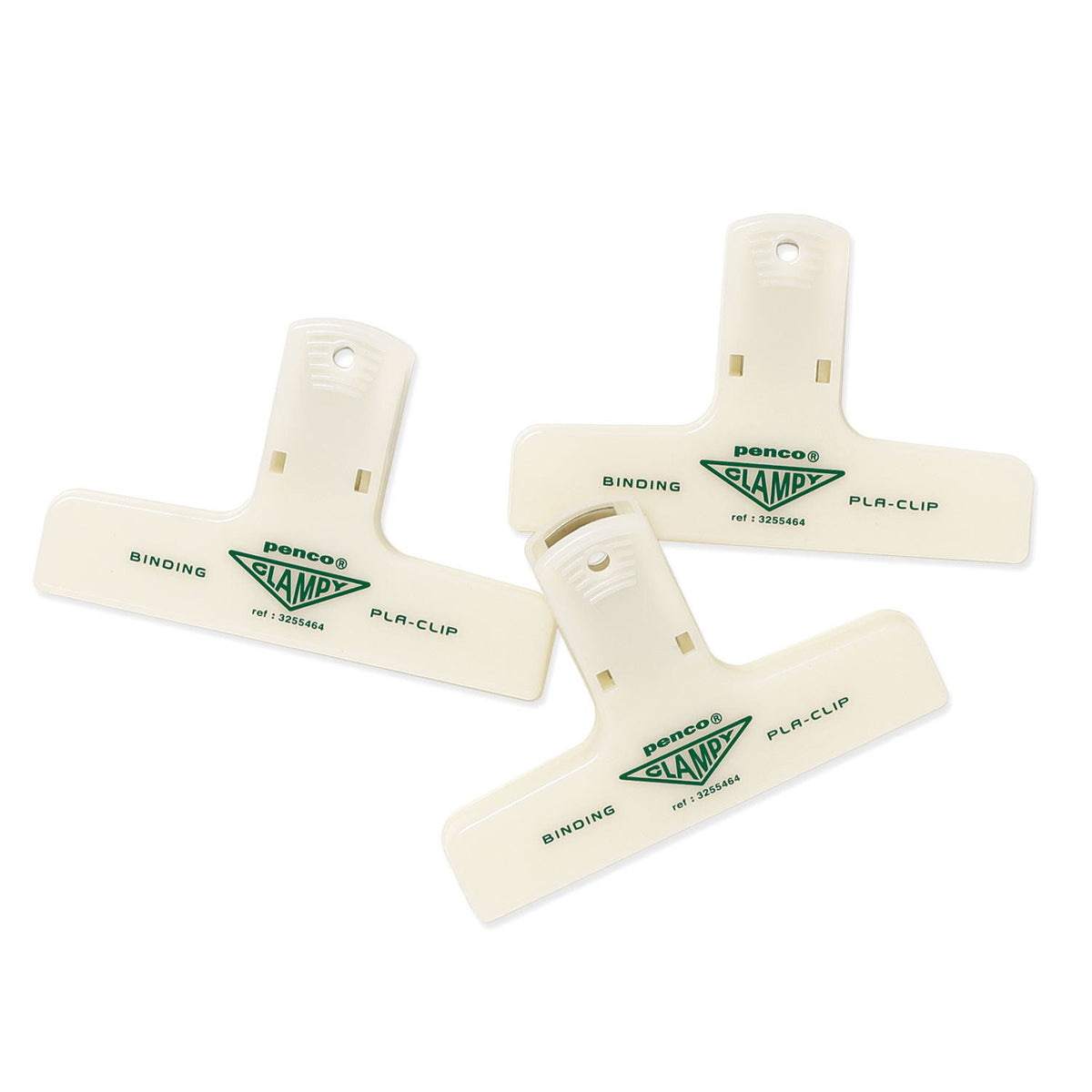 Three Penco glow-in-the-dark Clampy clips in daylight