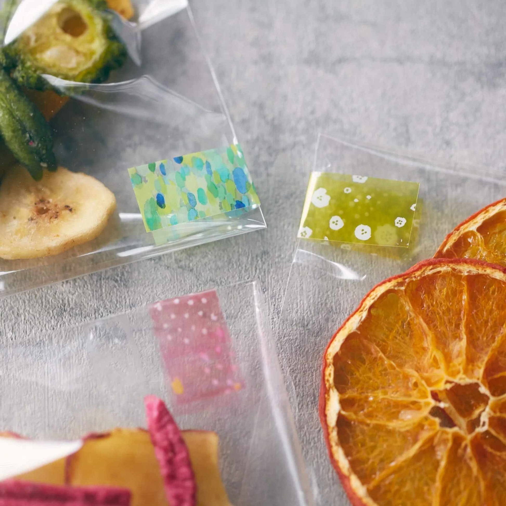 KITTA Clear PET Tape - Confetti booklet with four colourful transparent PET strip designs