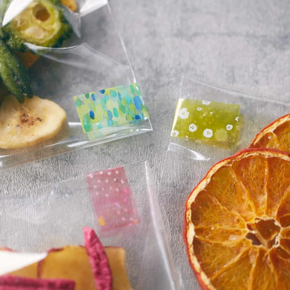 KITTA Clear PET Tape - Confetti booklet with four colourful transparent PET strip designs