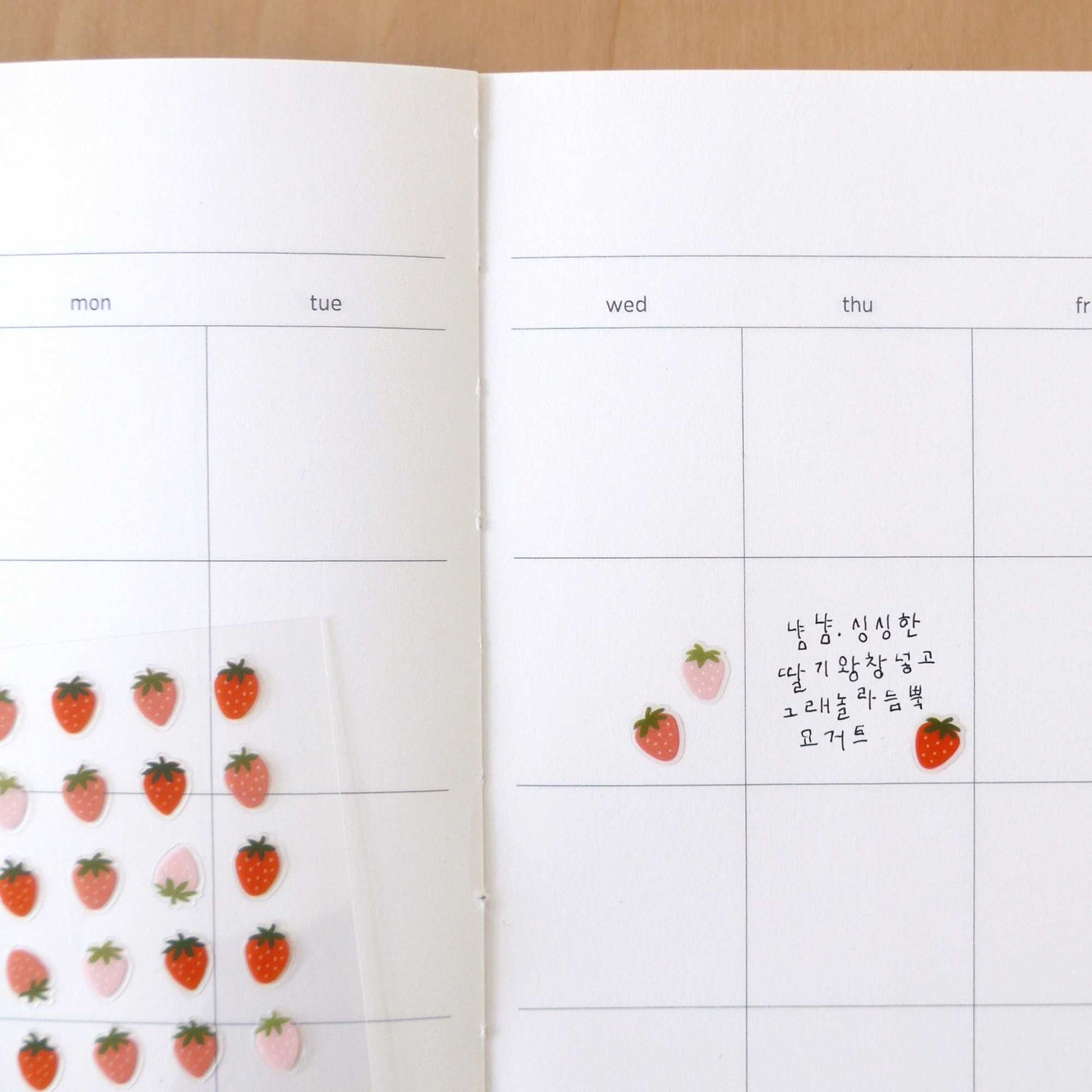 Suatelier Deco.20 strawberry mini sticker sheet with small red and pink strawberries in a clean, minimal style
