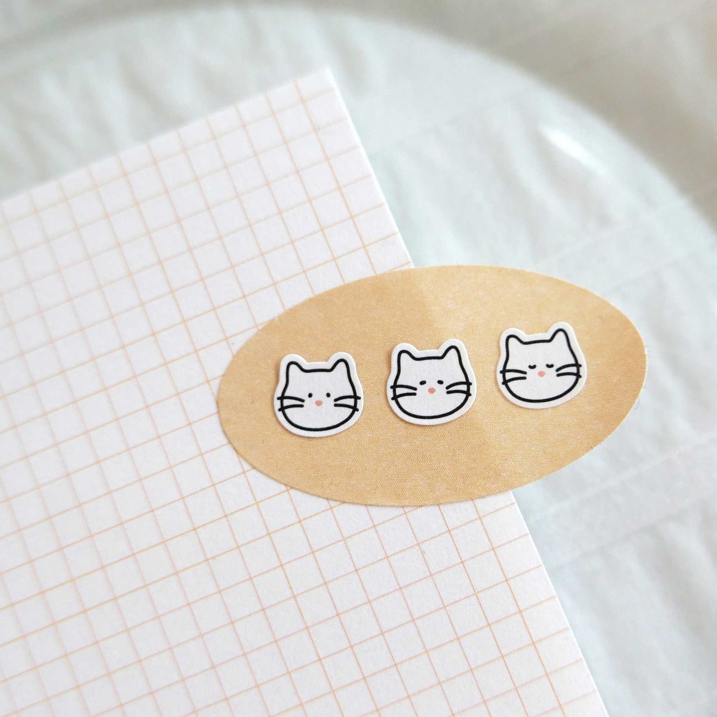 Suatelier Mini Series cat icon sticker sheet with small cat faces, paws and playful cat illustrations for planners and journaling