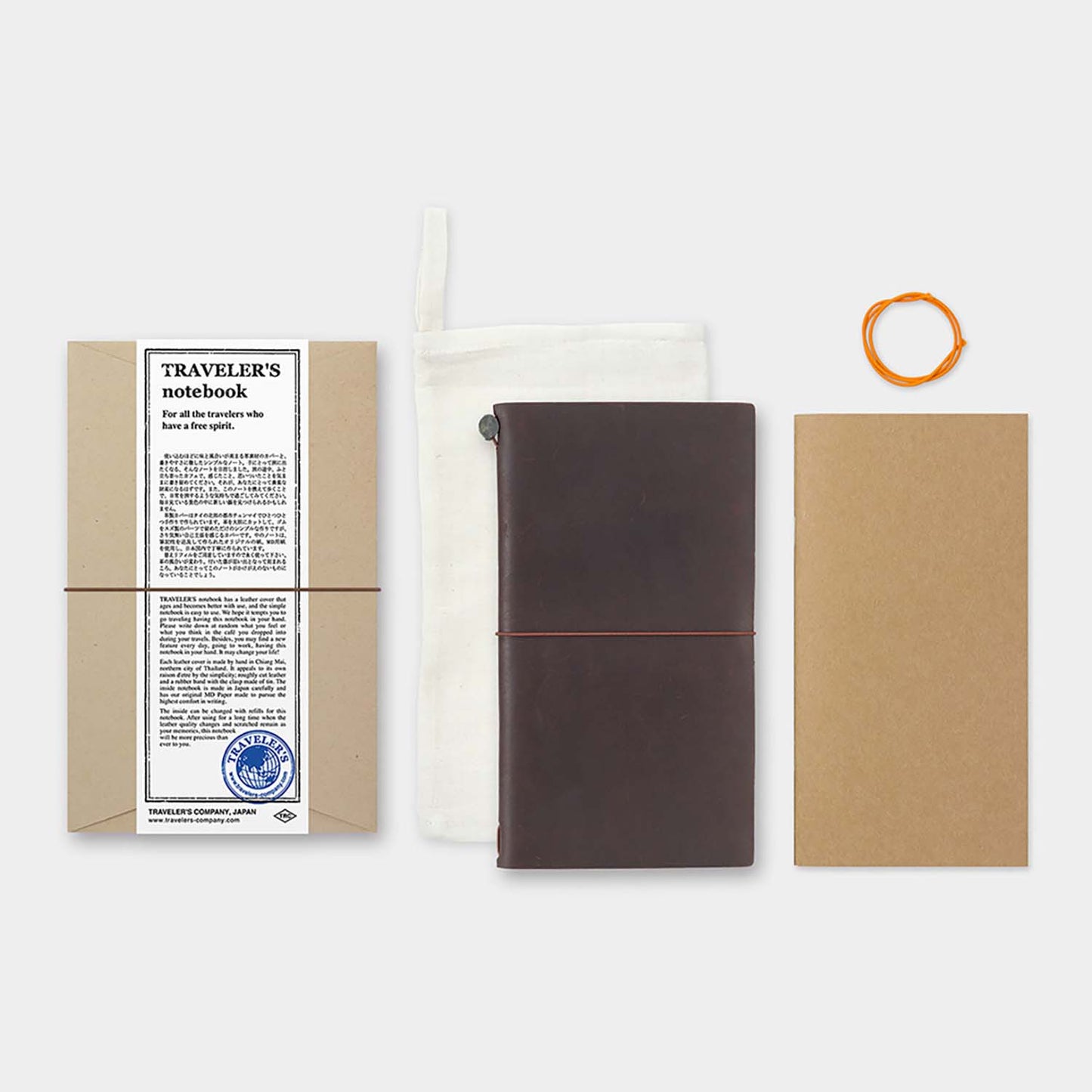 TRAVELER’S notebook Brown Regular Size leather cover by TRAVELER’S Company with blank refill, cotton bag and spare band
